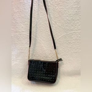Arcadia cross body black with red accents